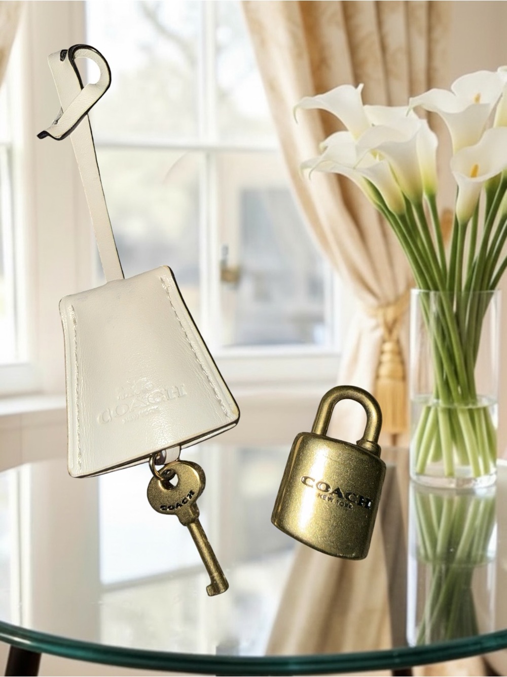 Authentic COACH Chalk White Leather Clochette & Antique Gold Padlock Charm Set